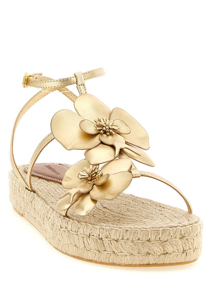 Platform Ankle Strap Sandals by Zimmermann for women in leather & rubber gold presents a sculptural silhouette, showcasing the Women's Leather & Rubber Platform Ankle Strap Sandals design with a sculptural platform and for a premium look.