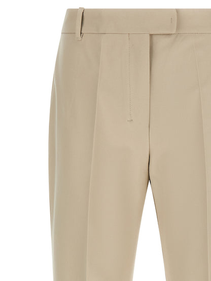 Trousers by S Max Mara for women in stretch viscose cotton beige presents a smart silhouette, meticulously detailed with a smart flared & cropped, a smart cropped, and a smart .