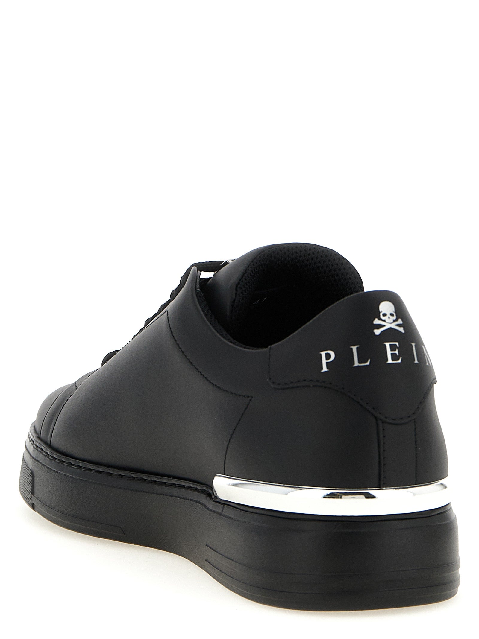 Sneakers by Philipp Plein for men in calfskin leather black & print presents a sumptuous silhouette, artfully capturing the essence of the Men's Low Top Calfskin Leather Sneakers with its sumptuous low-top style design.