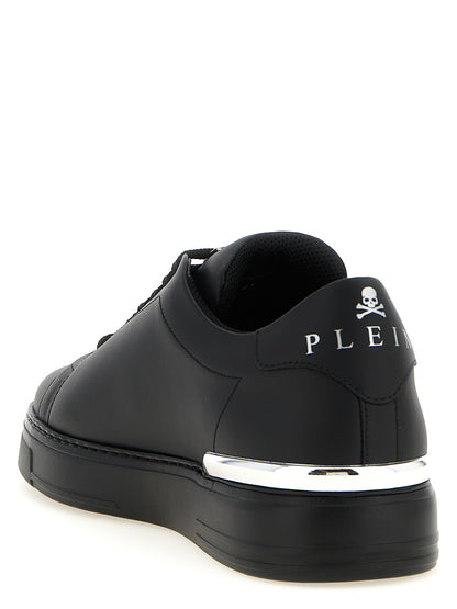 Sneakers by Philipp Plein for men in calfskin leather black & print presents a sumptuous silhouette, artfully capturing the essence of the Men's Low Top Calfskin Leather Sneakers with its sumptuous low-top style design.