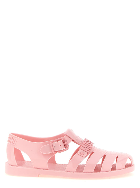 Flat Sandals by Moschino for women in pvc and multicolor & pink presents a captivating silhouette, showcasing the signature style of the Women's PVC Flat Sandals with a captivating flat and captivating .