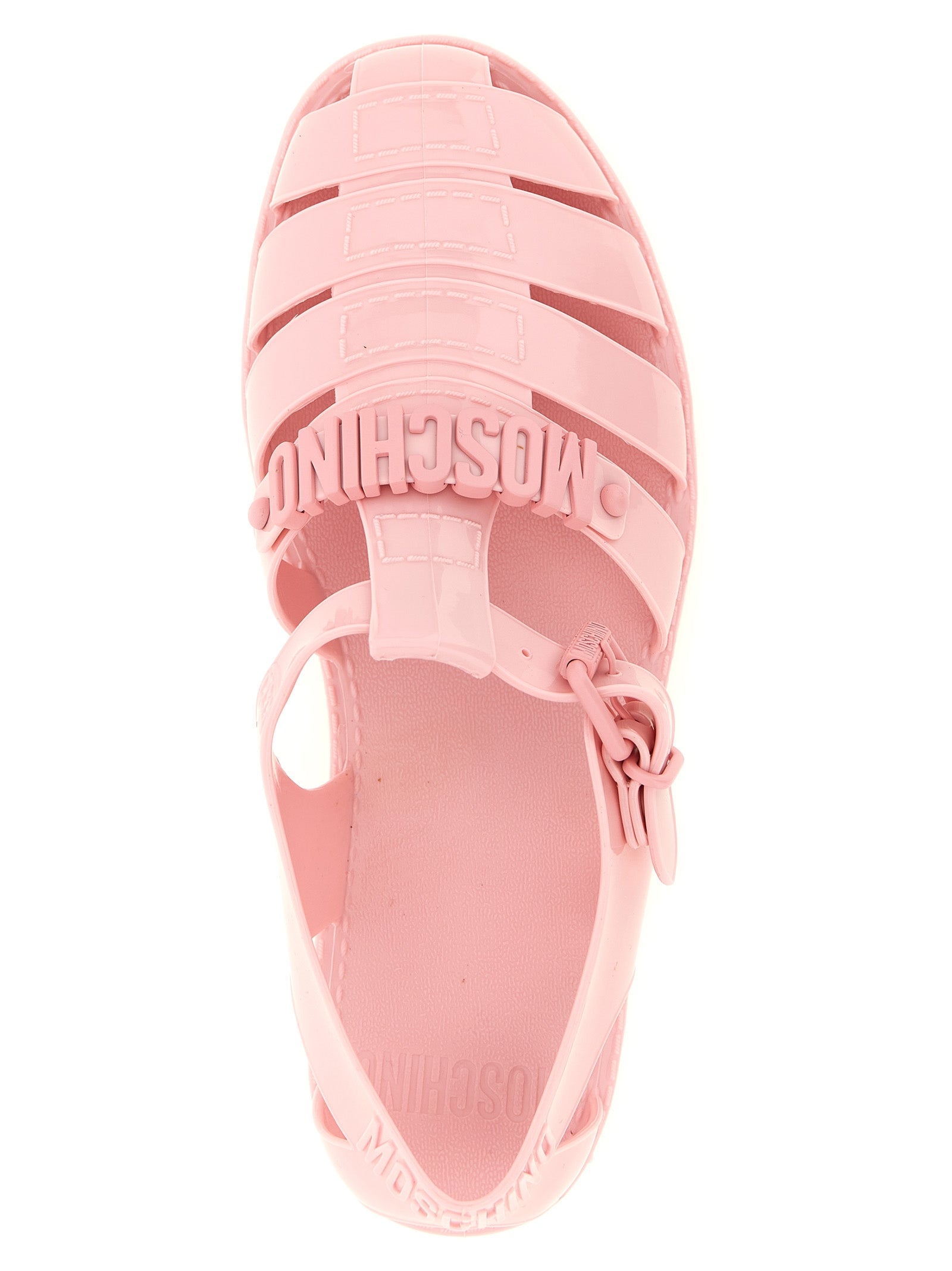 Flat Sandals by Moschino for women in pvc multicolor & pink features an effortlessly chic silhouette from the Women's PVC Flat Sandals collection, showcasing a effortlessly chic flat and elegant .