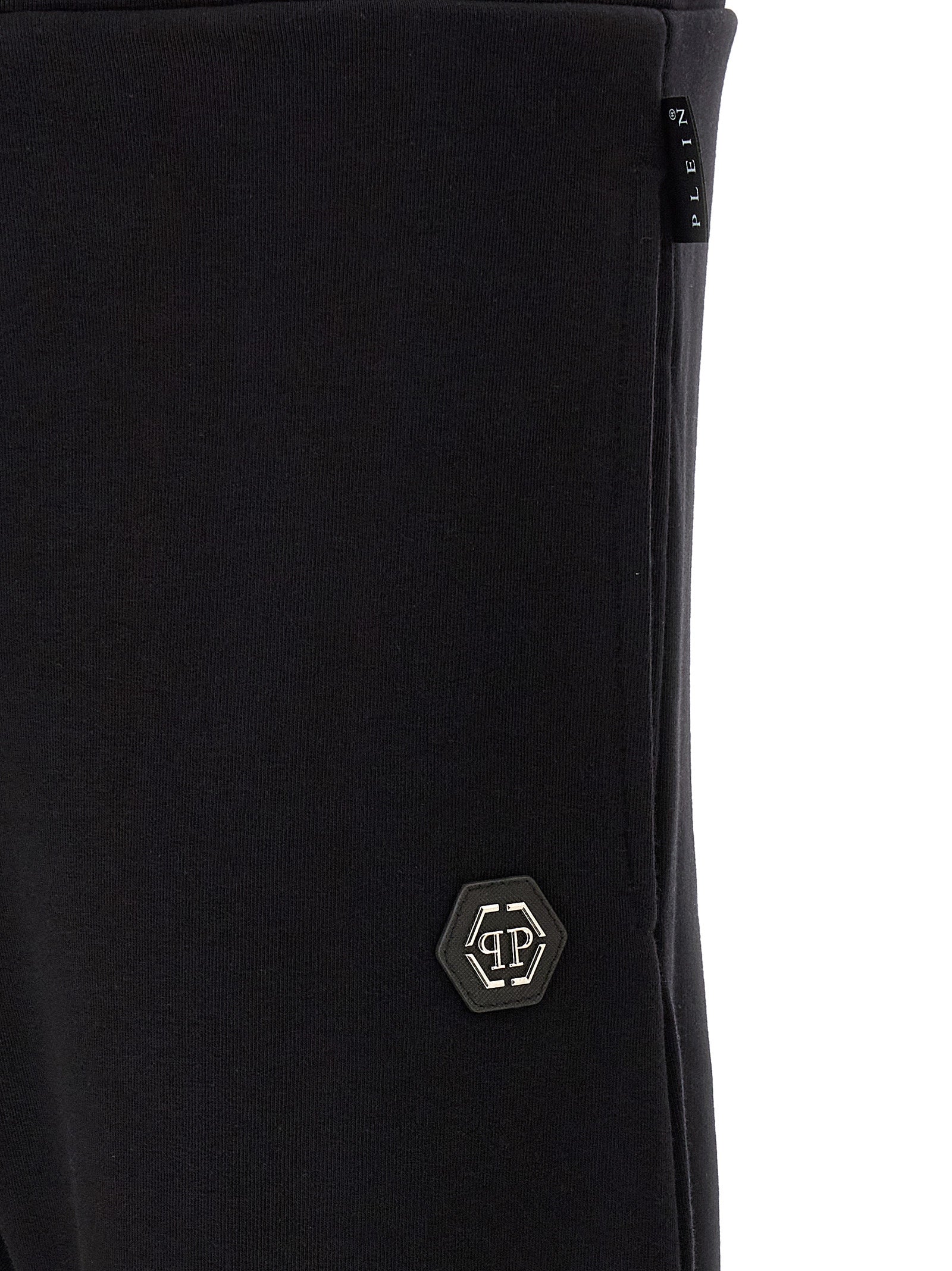 Joggers by Philipp Plein for men in cotton polyester black features a polished silhouette with a polished , reaching a polished long and finished with a polished .