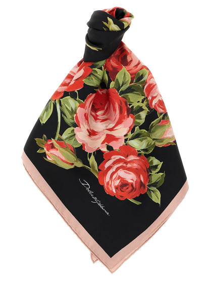 Scarf by Dolce & Gabbana for women in silk twill black, rose, floral & print showcases a warm silhouette from the Silk Twill Scarf collection, offering a warm drape that exudes sophisticated luxury.