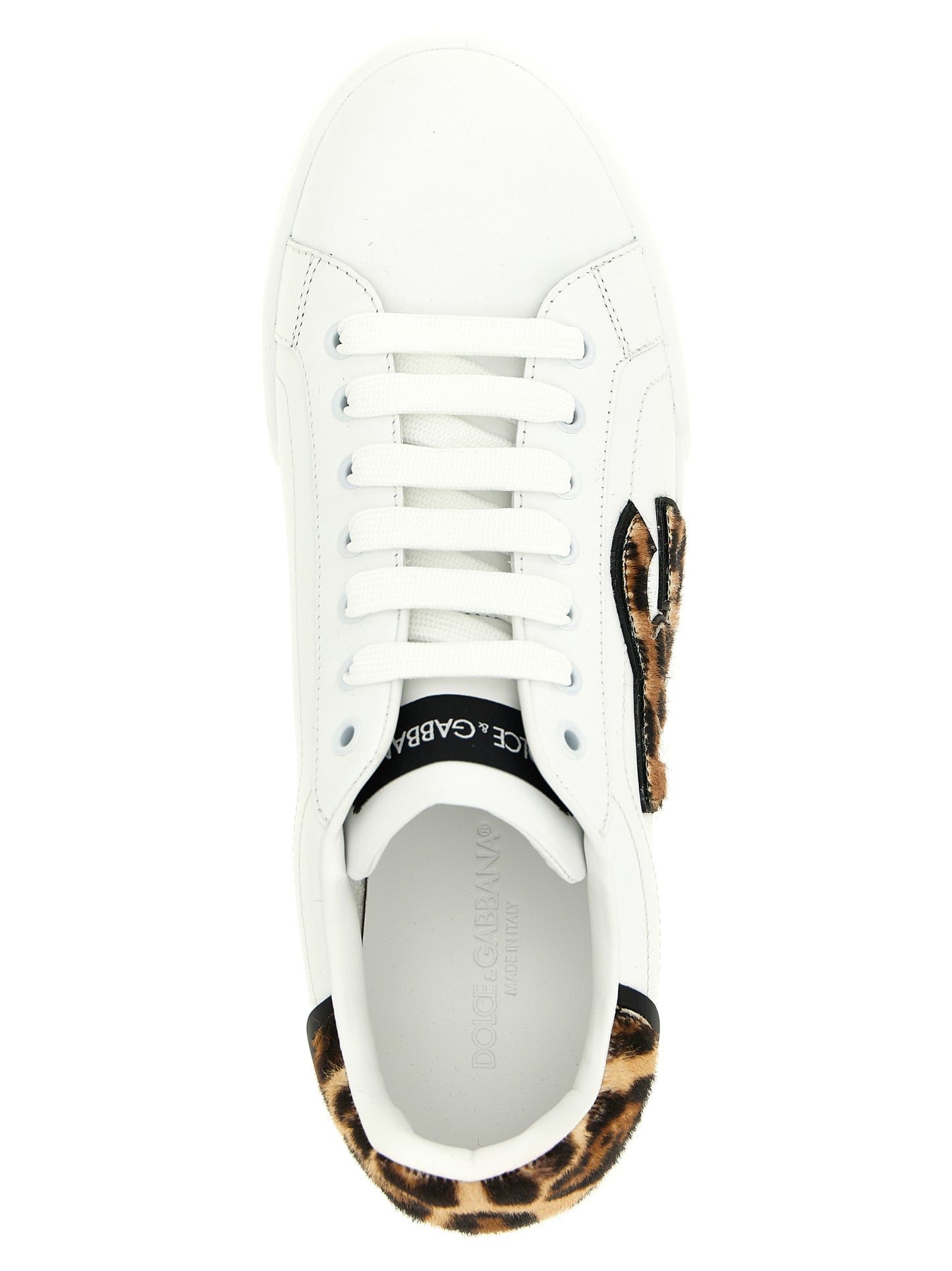 Sneakers by Dolce & Gabbana for women in eva & calfskin leather brown & print presents a sumptuous silhouette, artfully capturing the essence of the Pony Women's Low Top EVA & Calfskin Leather Sneakers with its sumptuous low-top style design.