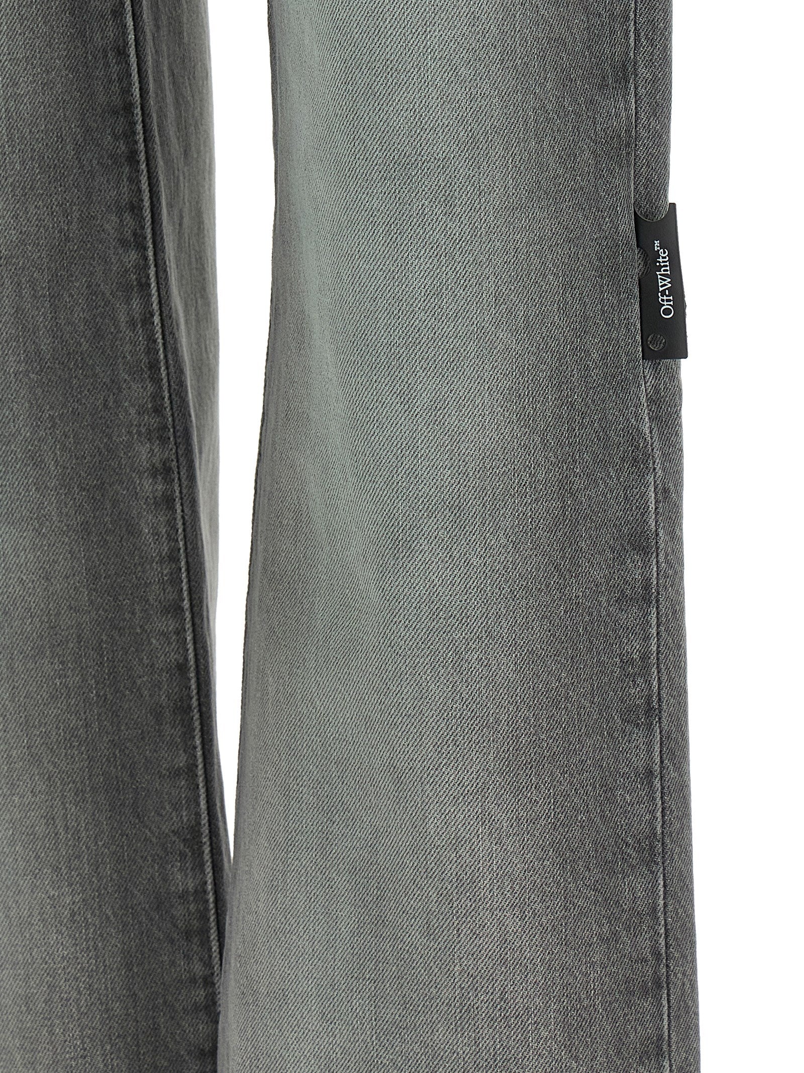 Jeans by Off-White for women in denim cotton gray, white, hooped & print features an sophisticated and straight-leg with a precise long, creating a sophisticated and sophisticated silhouette.
