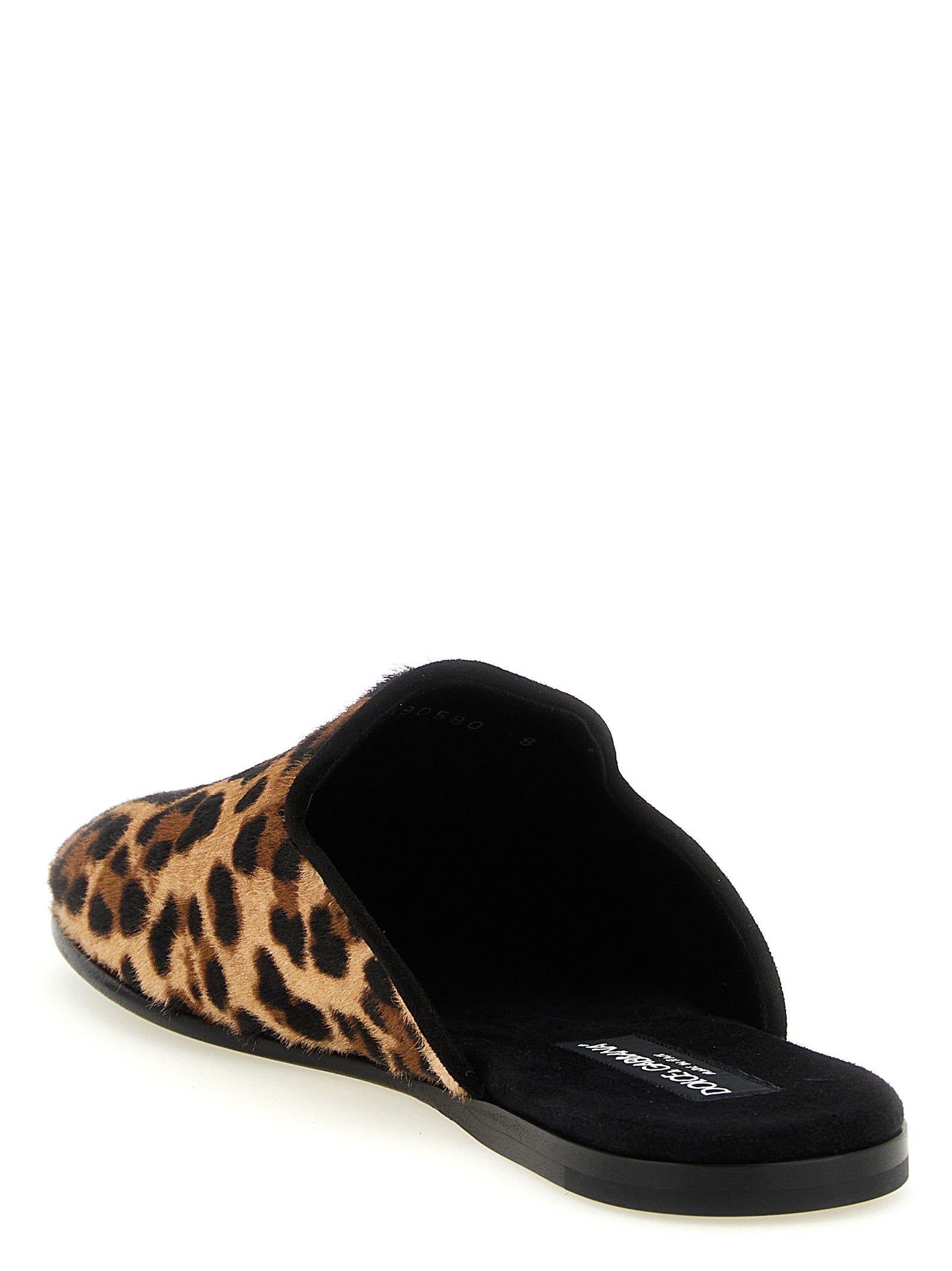 Flat Slippers Shoes by Dolce & Gabbana for men in tu goat & calfskin leather brown & print showcases a timeless silhouette from the Pony Men's TU Goat & Calfskin Leather Flat Slippers Shoes collection, featuring a timeless flat and for a timeless finish.