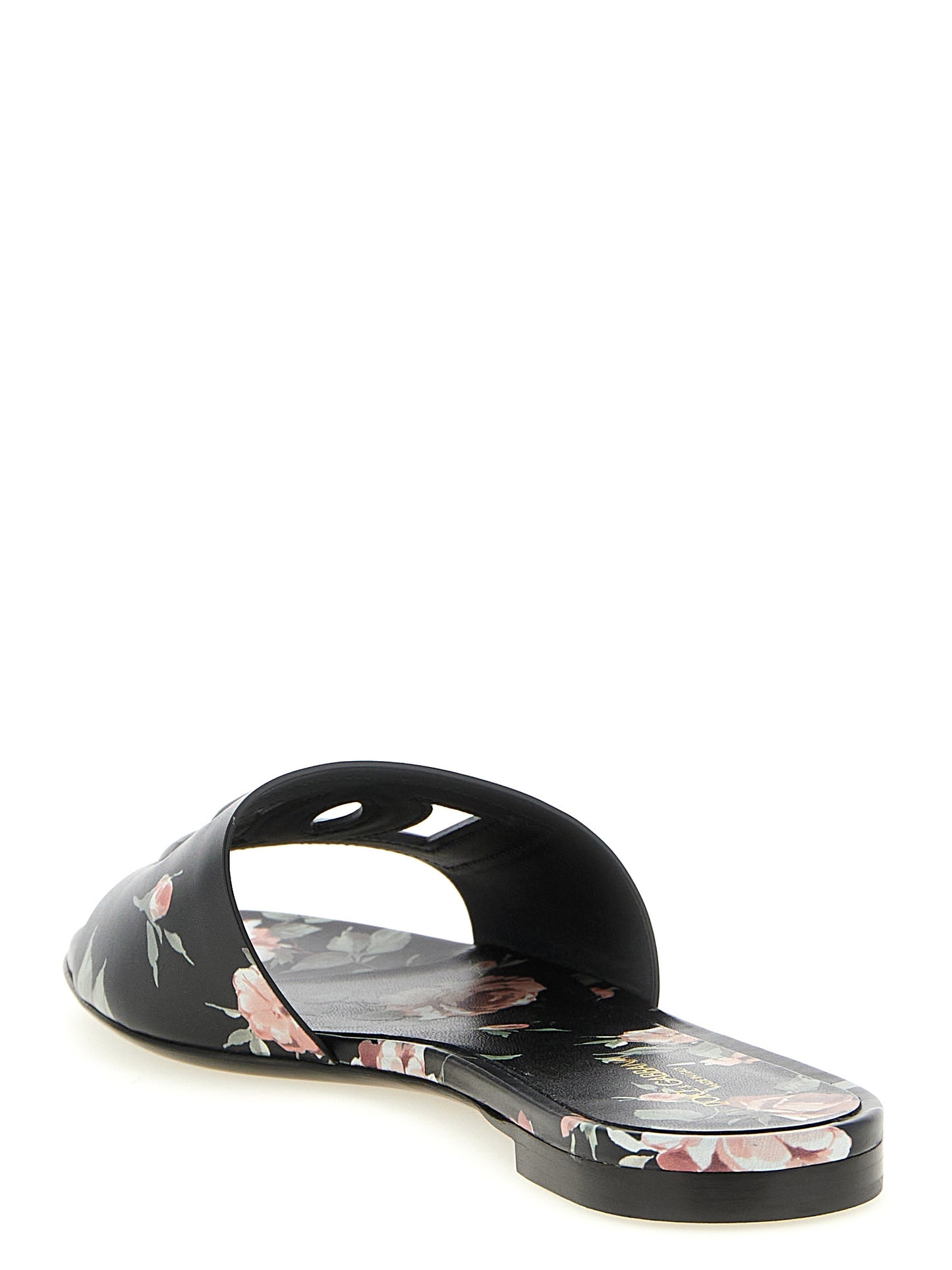 Sliders Flat Shoes by Dolce & Gabbana for women in calfskin leather black, rose & print showcases a enchanting silhouette as part of the Women's Calfskin Leather Sliders Flat Shoes collection, defined by a enchanting and for a enchanting look.