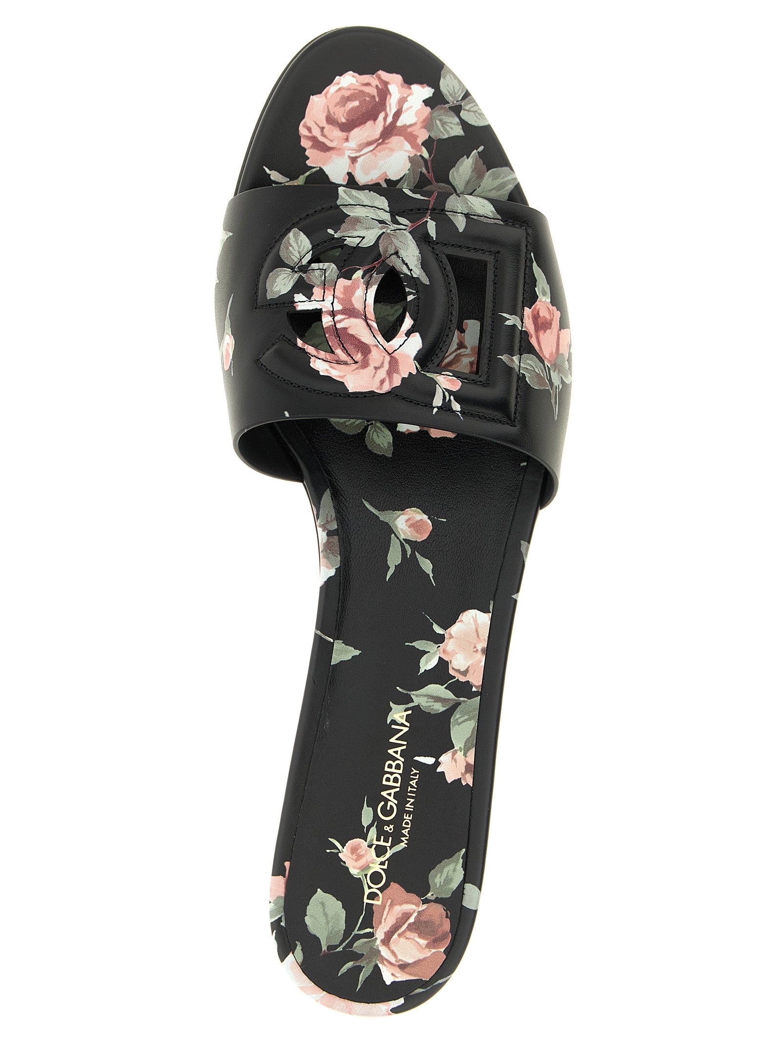 Sliders Flat Shoes by Dolce & Gabbana for women in calfskin leather black, rose & print presents a effortless chic silhouette, showcasing the Women's Calfskin Leather Sliders Flat Shoes design with a effortless chic and for a sophisticated look.
