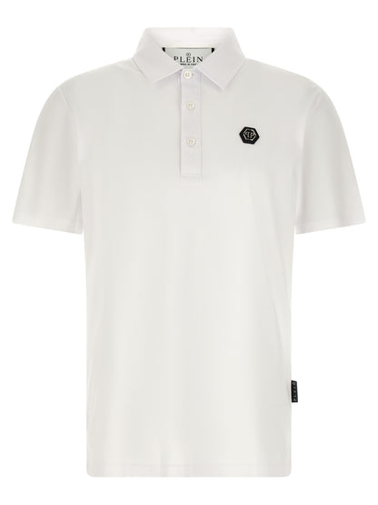 Polo Shirt by Philipp Plein for men in cotton white showcases a sharp silhouette, detailed with a refined and sharp short-sleeve for a sophisticated finish.