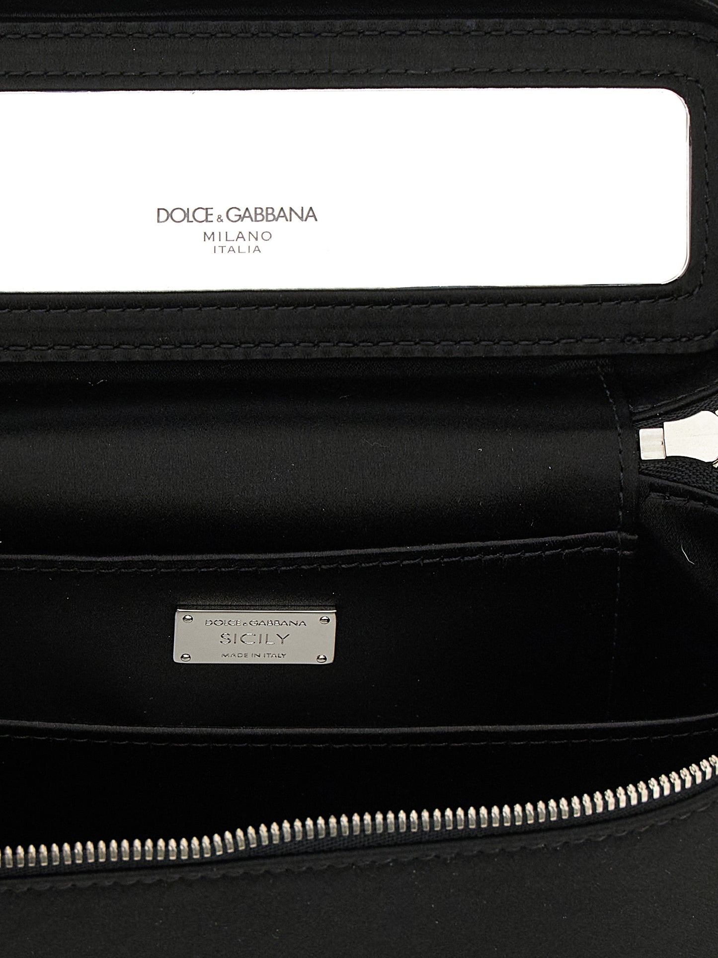 Medium Crossbody Handbag by Dolce & Gabbana for women in polyurethane black features a versatile chic silhouette, meticulously detailed with a secure zipper, ample , and versatile crossbody-strap & shoulder-strap.