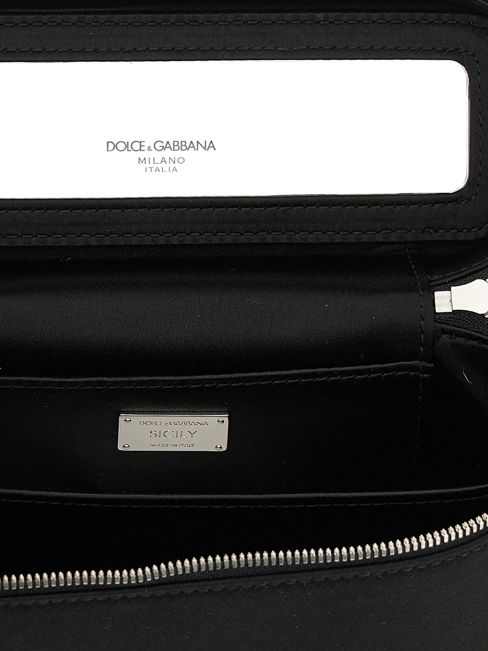 Medium Crossbody Handbag by Dolce & Gabbana for women in polyurethane black features a versatile chic silhouette, meticulously detailed with a secure zipper, ample , and versatile crossbody-strap & shoulder-strap.