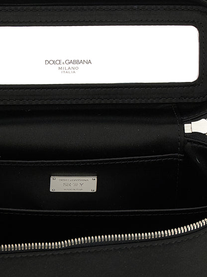 Medium Crossbody Handbag by Dolce & Gabbana for women in polyurethane black features a versatile chic silhouette, meticulously detailed with a secure zipper, ample , and versatile crossbody-strap & shoulder-strap.