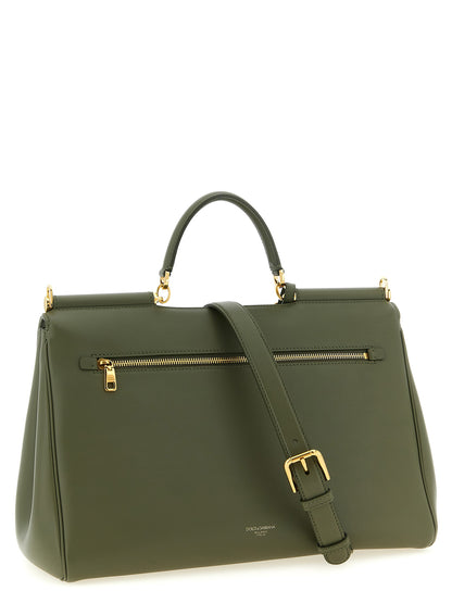 This Flap Handbag by Dolce & Gabbana for women in bos taurus calf suede leather and bicolour & green presents a sculptural silhouette featuring a secure flap & zipper, ample , and versatile shoulder-strap, adjustable-strap & handle for a sculptural finish.