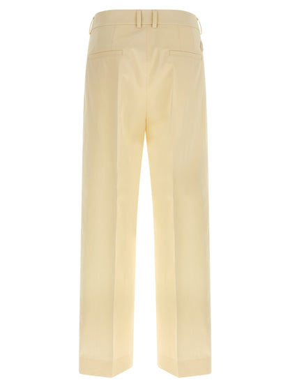 Trousers by Moncler for women in leather & cotton beige features a artisanal silhouette, showcasing a sophisticated straight-leg & wide with a long and for a artisanal finish.