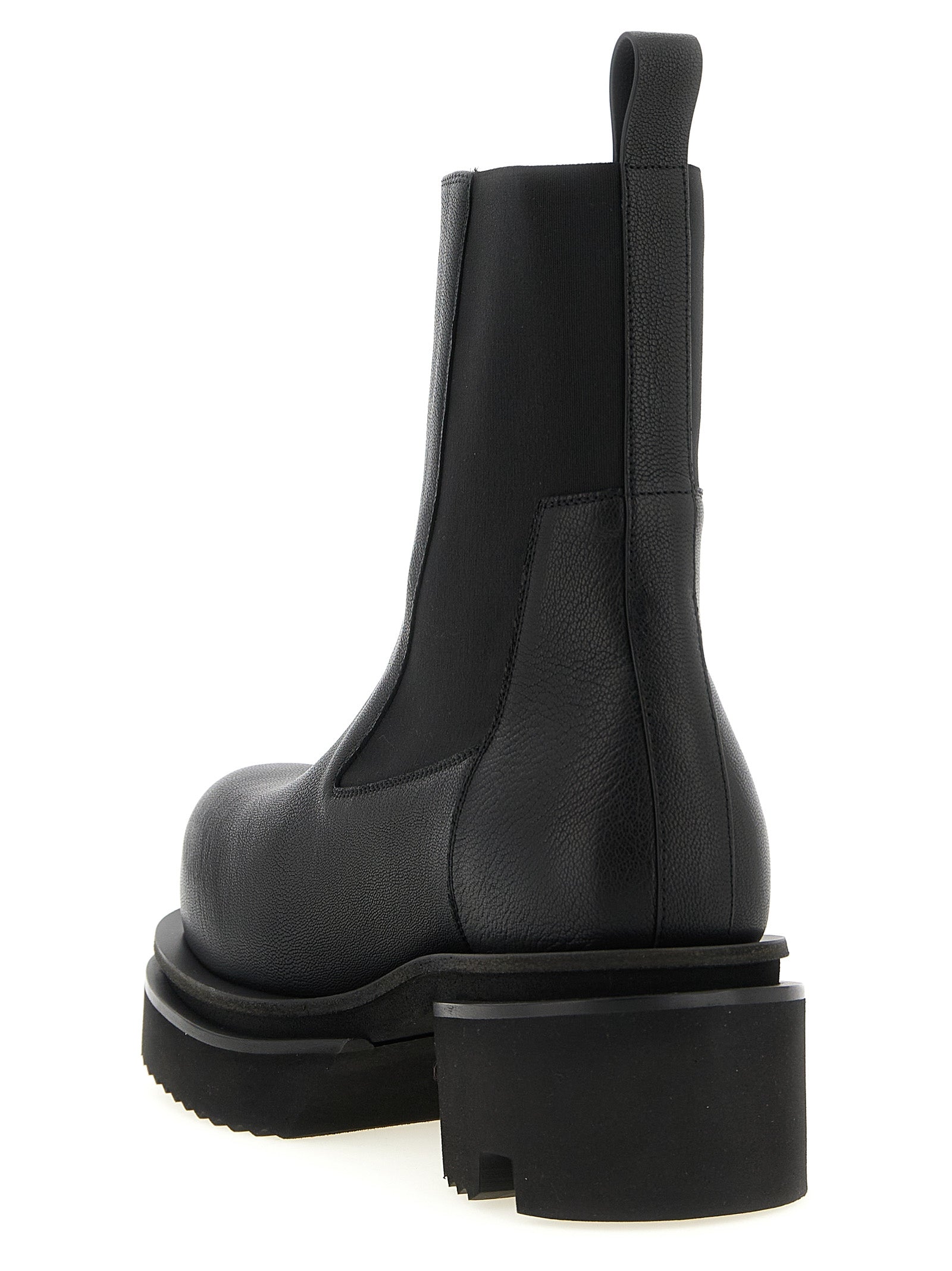 Platform Ankle Boots by Rick Owens for men in goatskin leather black & natural features an effortless chic silhouette from the Men's Goatskin Leather Platform Ankle Boots collection, showcasing a effortless chic platform and refined for an effortless chic look.
