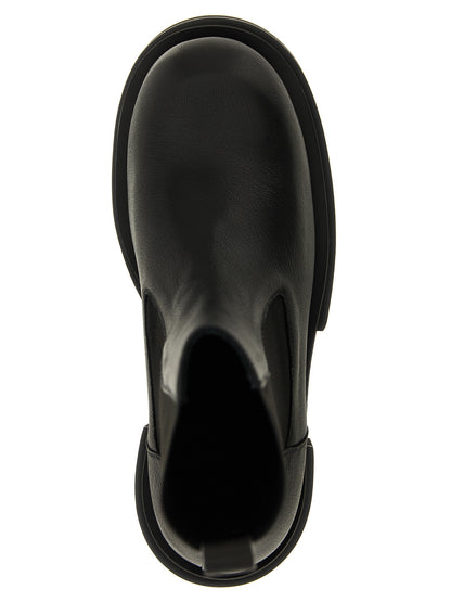 Platform Ankle Boots by Rick Owens for men in goatskin leather black & natural showcases a impeccable silhouette as Men's Goatskin Leather Platform Ankle Boots, artfully defined by a impeccable platform and a impeccable .