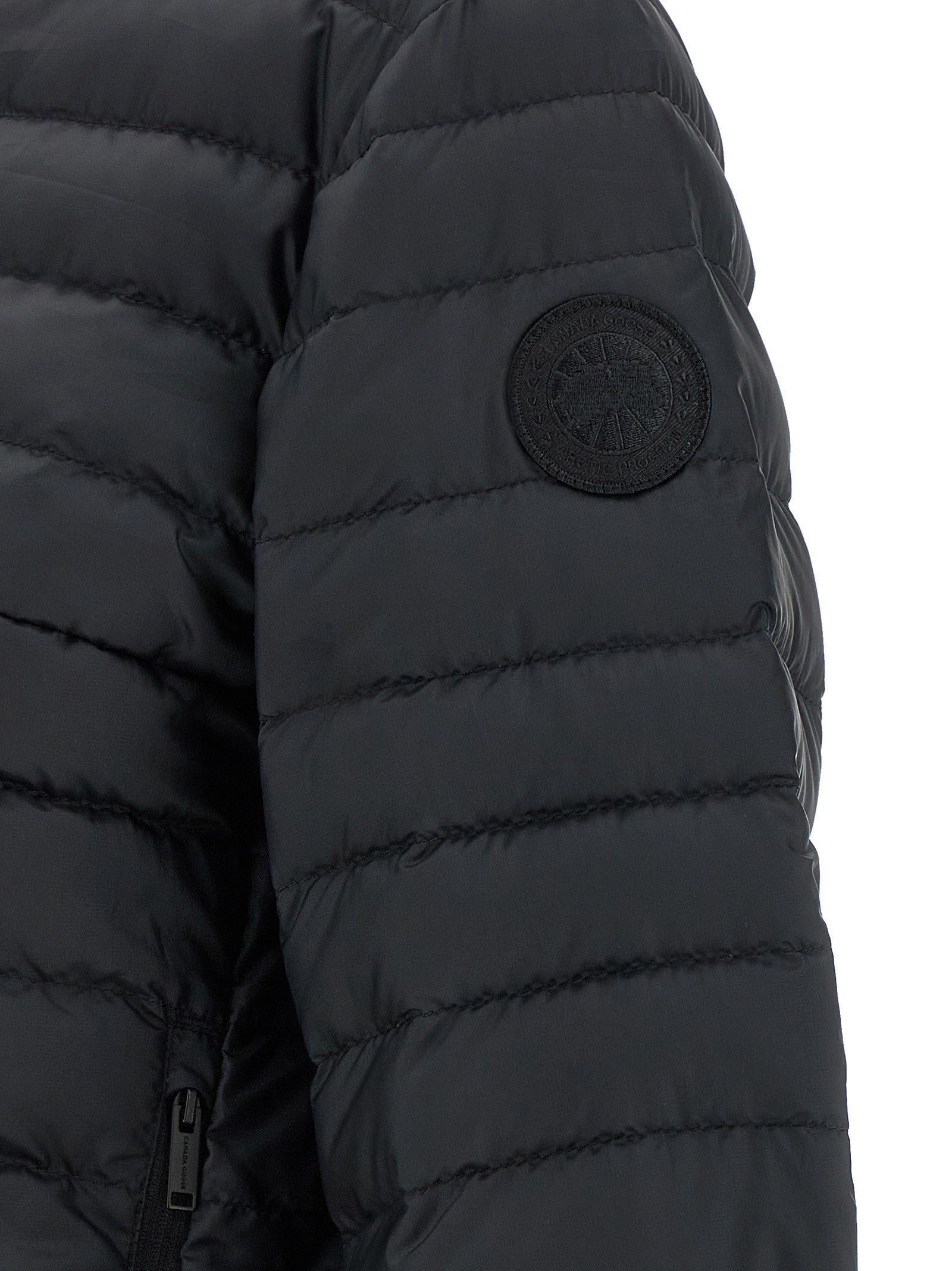 Hooded Puffer Jacket by Canada Goose for women in polyamide black features a city-ready silhouette, detailed with pockets, hooded & insulated and a city-ready .