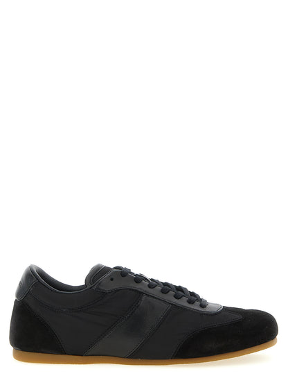 Athletic Sneakers by Lemaire for women in polyamide suede leather black features an effortless chic silhouette, showcasing the signature athletic style of the Women's Athletic Polyamide Suede Leather Sneakers collection with a truly effortless chic finish.