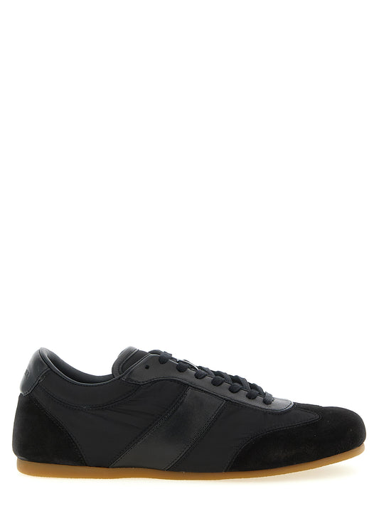 Athletic Sneakers by Lemaire for women in polyamide suede leather black features an effortless chic silhouette, showcasing the signature athletic style of the Women's Athletic Polyamide Suede Leather Sneakers collection with a truly effortless chic finish.