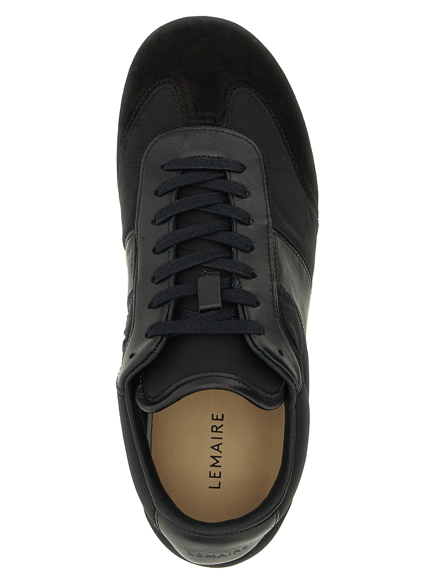 Athletic Sneakers by Lemaire for women in polyamide suede leather black showcases an impeccable silhouette, defined by an impeccable athletic style design that perfectly captures the essence of the Women's Athletic Polyamide Suede Leather Sneakers.