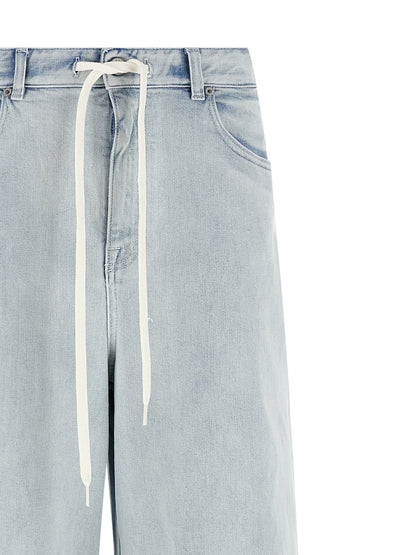 Jeans by MM6 Maison Margiela for women in stretch denim cotton light-blue, white & signature presents a tailored silhouette, showcasing a tailored straight-leg & relaxed-fit and long cut with a refined for a truly tailored aesthetic.