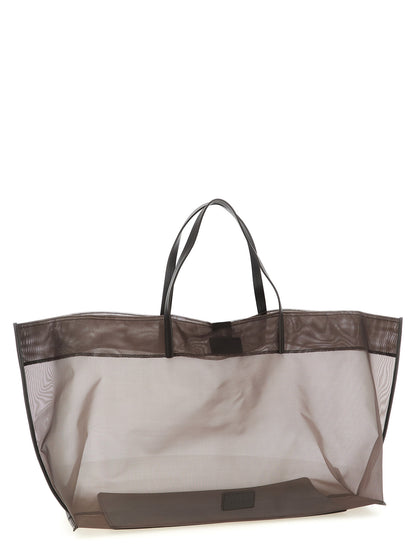 Large Shopper Tote Clutch Bag by Staud for women in leather brown & transparent showcases a statuesque Christos Leather Large Shopper Tote Clutch Bag design, featuring a secure magnetic, ample , and versatile handle for a statuesque finish.