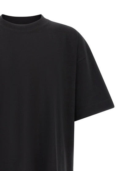 T-Shirt by Dries Van Noten for men in cotton black showcases a unassuming silhouette, artfully detailed with a refined and unassuming for a sophisticated, contemporary look.