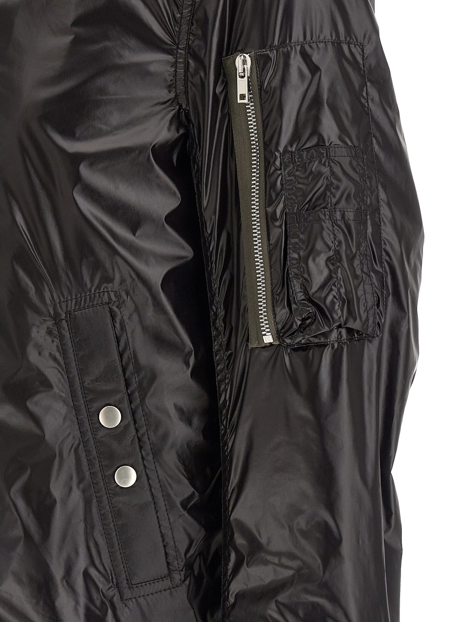 Bomber Jacket by Rick Owens for men in nylon black features a city-ready silhouette, detailed with pockets and a city-ready .