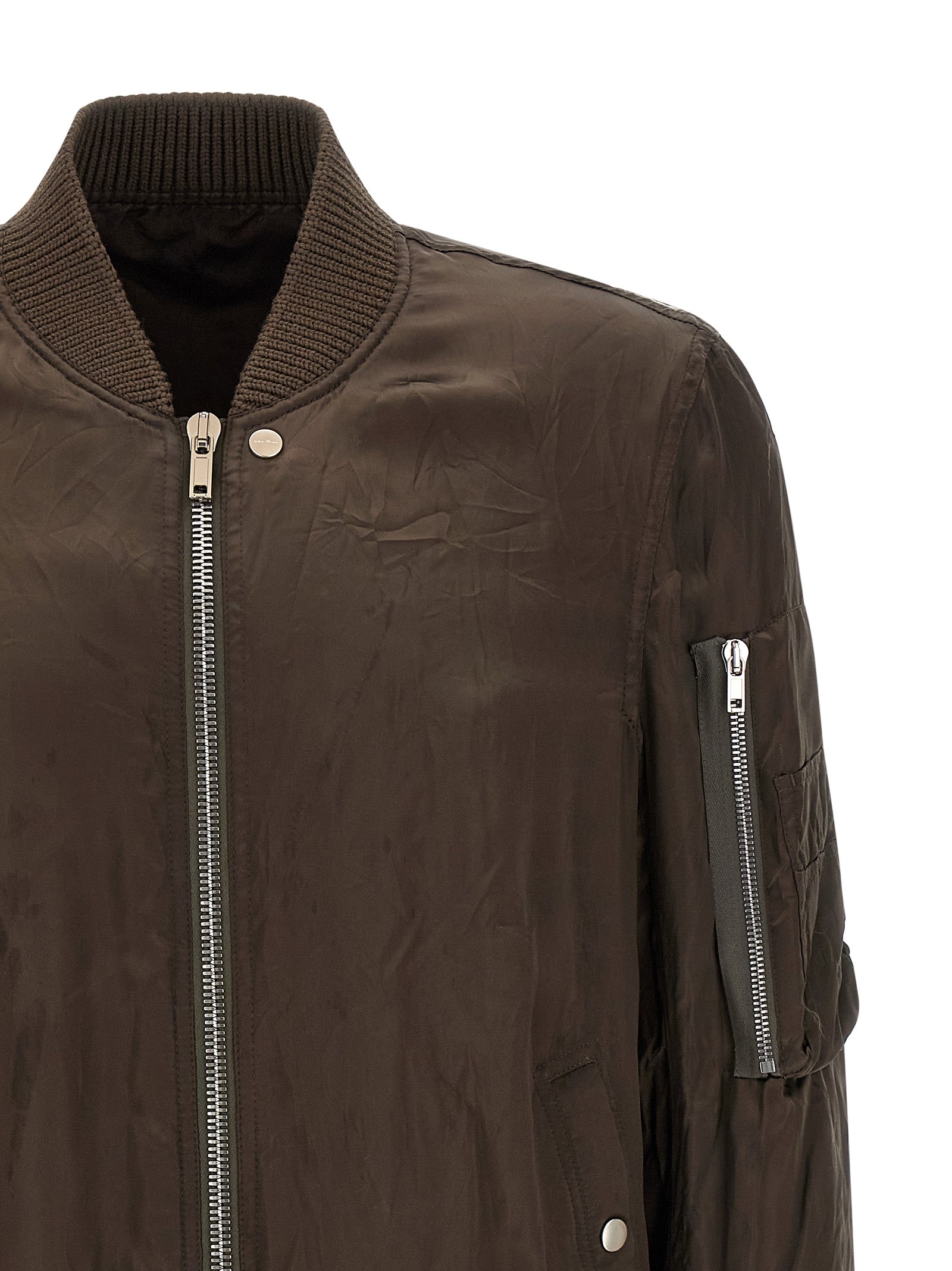 Bomber Jacket by Rick Owens for men in nylon & cupro brown & copper showcases a bohemian silhouette, artfully detailed with a bohemian and signature pockets & insulated for a truly bohemian finish.