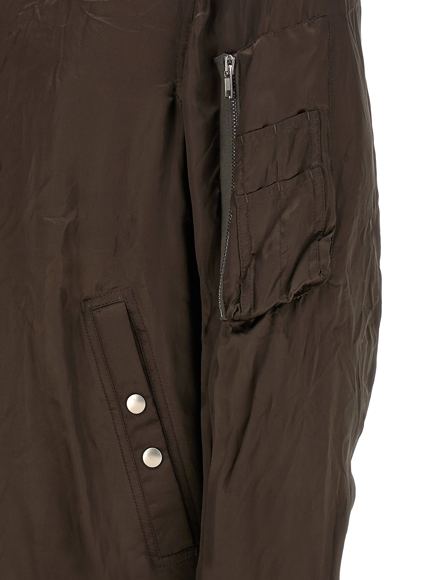 Bomber Jacket by Rick Owens for men in nylon & cupro brown & copper features a city-ready silhouette, detailed with pockets & insulated and a city-ready .
