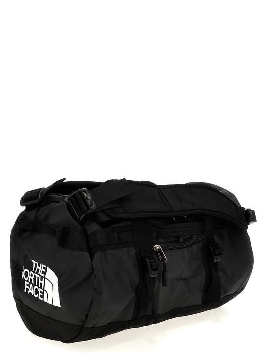 Travel Backpack by The North Face for unisex in lyocell polyester mesh black features a utilitarian chic Base Camp Duffel Lyocell Polyester Mesh Travel Backpack design with a secure , ample , and versatile backpack-strap, adjustable-strap & handle for a utilitarian chic finish.