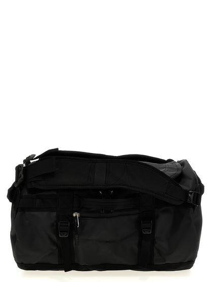 Travel Backpack by The North Face for unisex in lyocell polyester mesh black features a fashionable silhouette, showcasing the Base Camp Duffel Lyocell Polyester Mesh Travel Backpack design with a secure , ample , and versatile backpack-strap, adjustable-strap & handle.