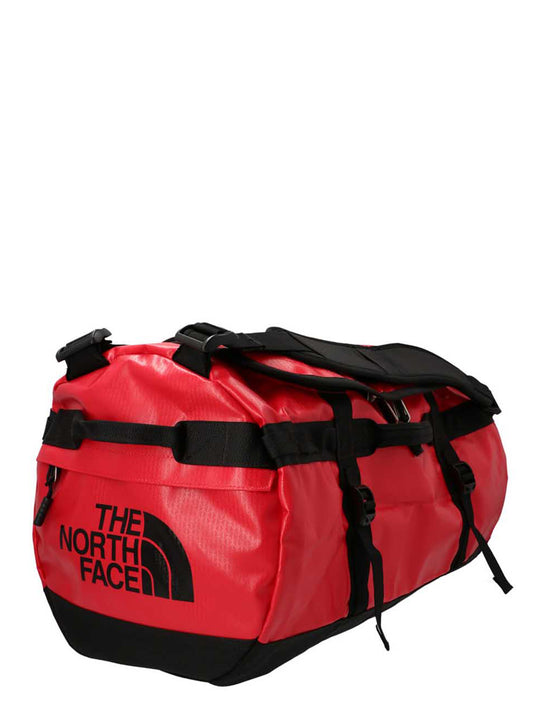 Backpack by The North Face for unisex in lyocell polyester mesh multicolor, red & transparent showcases an architectural Base Camp Duffel Lyocell Polyester Mesh Backpack design, featuring a secure , ample document-holder, and architectural backpack-strap, adjustable-strap & handle for a sophisticated look.