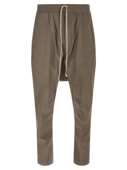 Casual Pants by Rick Owens for men in stretch cotton gray presents a tailored silhouette, showcasing a tailored and long cut with a refined for a truly tailored aesthetic.