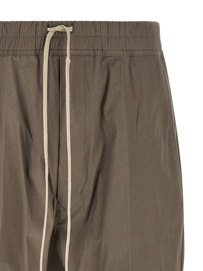 Casual Pants by Rick Owens for men in stretch cotton gray presents a refined pantology silhouette, artfully defined by a refined pantology , long, and a sophisticated .
