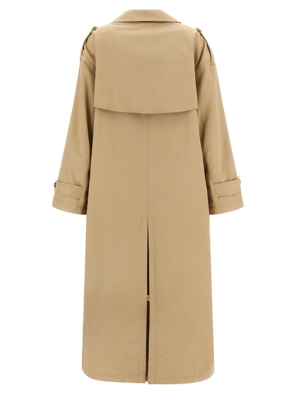 Trench Coat by MM6 Maison Margiela for women in stretch cotton beige presents a utilitarian silhouette, showcasing a utilitarian lapel neckline and sophisticated pockets for a truly utilitarian look.