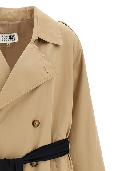 Trench Coat by MM6 Maison Margiela for women in stretch cotton beige showcases a contemporary silhouette, detailed with a contemporary lapel neckline and distinctive pockets for a truly contemporary finish.
