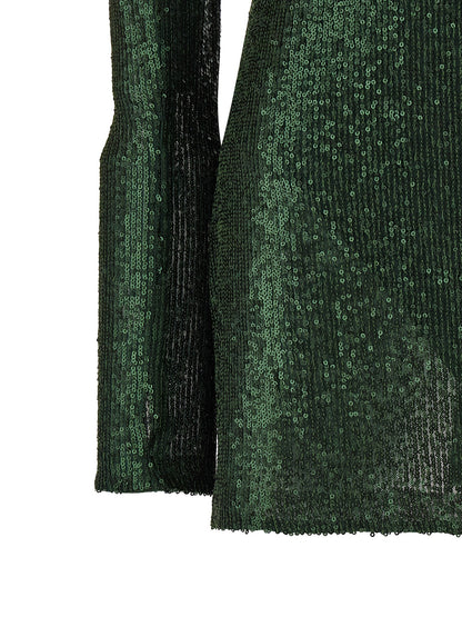 Dress by Norma Kamali for women in polyester & sequins bicolour & green features an magnificent silhouette, artfully detailed with a magnificent and that flows into an magnificent short.