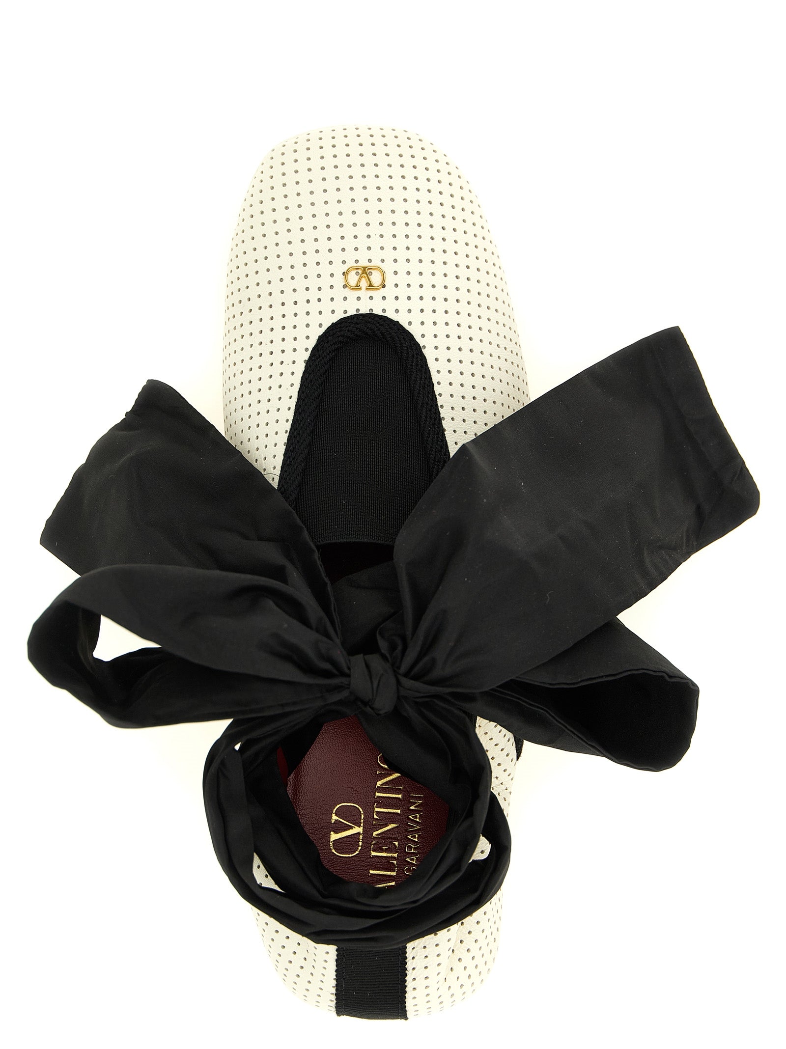 Ballet Flat Shoes by Valentino Garavani for women in lamb leather bicolour, black, white & signature showcases a dynamic silhouette, artfully capturing Ribbon V Logo Women's Lamb Leather Ballet Flat Shoes through its distinctive and elegant square toe style.