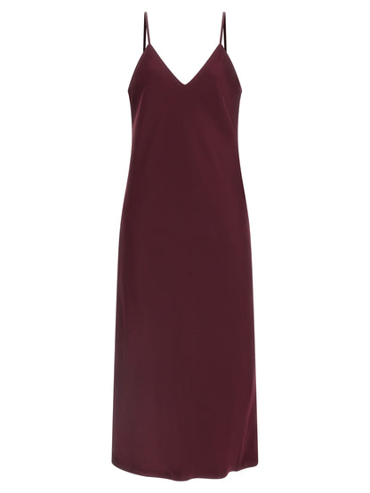 Dress by Norma Kamali for women in polyester satin bordeaux features an cute silhouette, detailed with a sleeveless and v-neck neckline that elegantly flows into a cute midi.