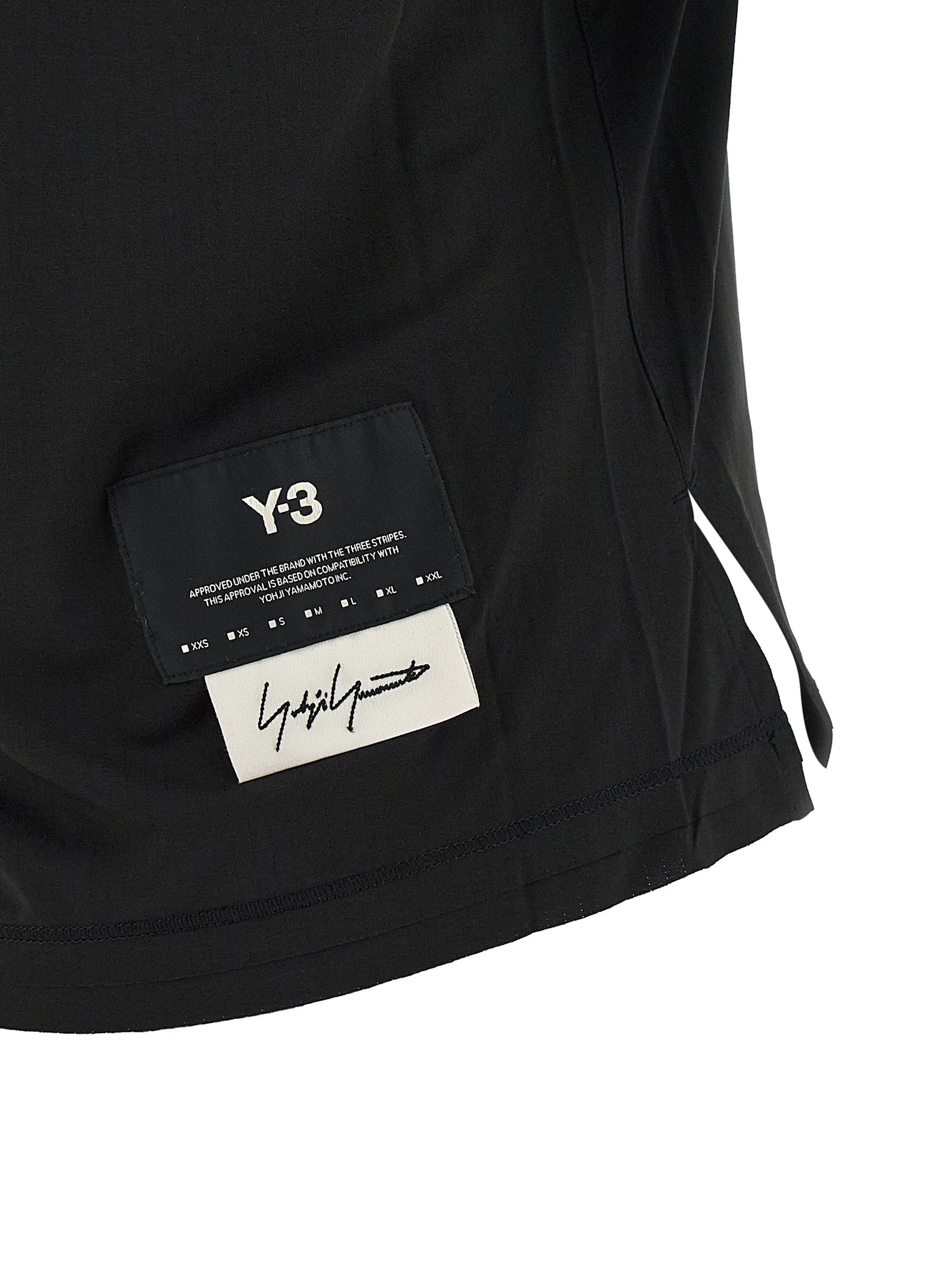 Activewear T-Shirt by Y-3 for women in polyester black presents a kinetic silhouette, showcasing the kinetic and alongside functional for a premium, athletic look.