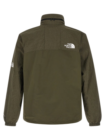Hooded Windbreaker Jacket by The North Face for men in stretch nylon bicolour, green & print features an stylish silhouette, showcasing a sophisticated hooded neckline and performance-driven breathable-design, lightweight, hooded & windproof for a premium, stylish look.