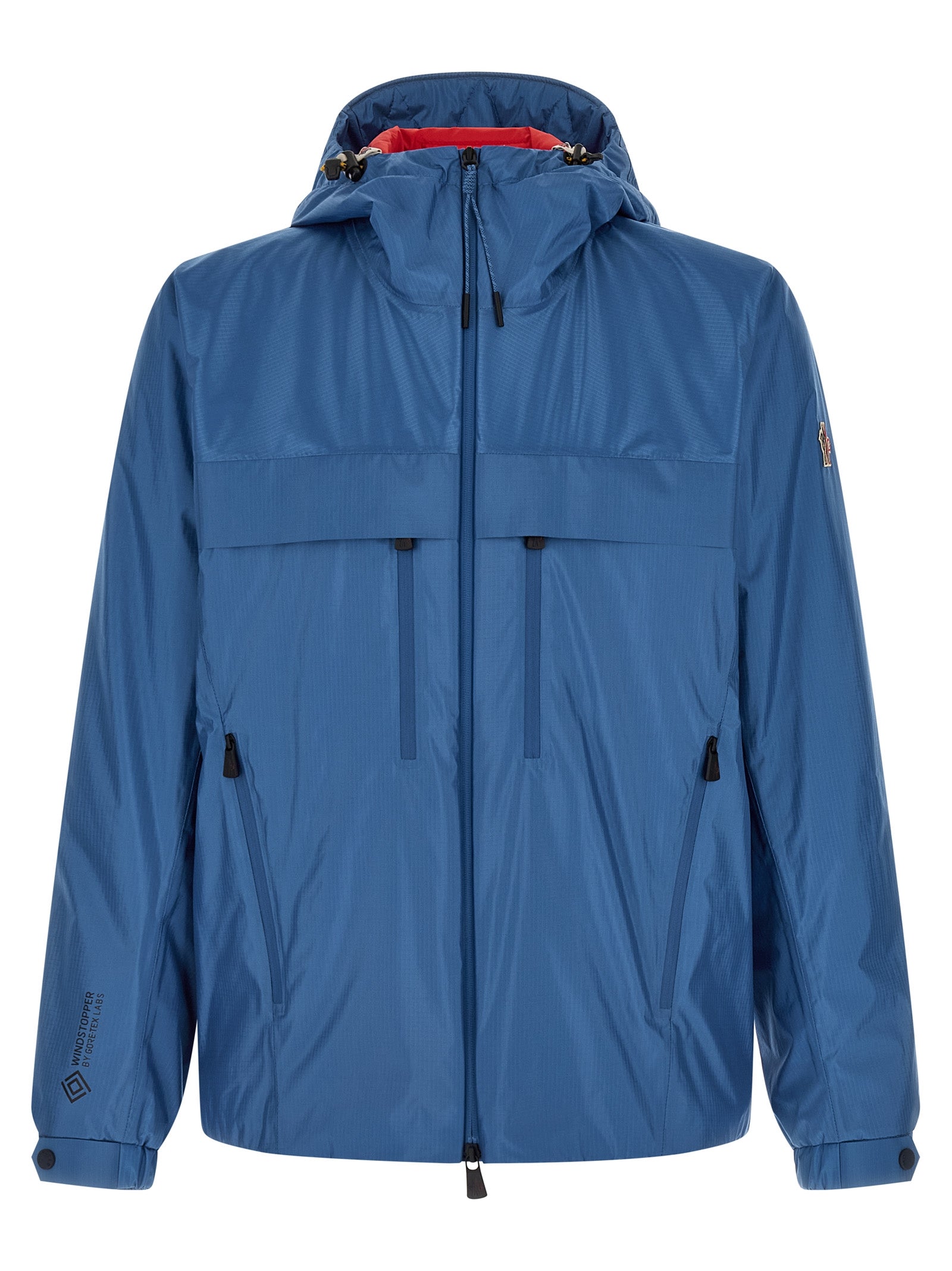 Hooded Windbreaker Jacket by Moncler Grenoble for men in polyamide & polyester blue features an enduring silhouette, showcasing technical hooded, insulated & windproof and a sophisticated hooded neckline for a truly enduring aesthetic.