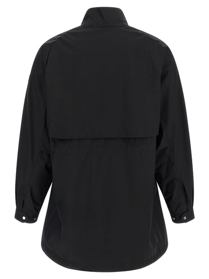Windbreaker Jacket by Tatras for women in nylon black & signature features an enduring silhouette, showcasing technical lightweight & windproof and a sophisticated high-neck neckline for a truly enduring aesthetic.
