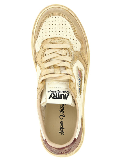 Sneakers by Autry for women in cowhide leather multicolor presents a sumptuous silhouette, artfully capturing the essence of the Women's Low Top Cowhide Leather Sneakers with its sumptuous low-top style design.