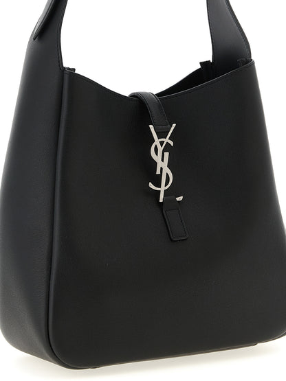 Micro Shoulder Clutch Bag by Saint Laurent for women in suede calfskin leather black features a effortless sophistication silhouette, secured by a with ample and versatile shoulder-strap, adjustable-strap & handle for a effortless sophistication finish.