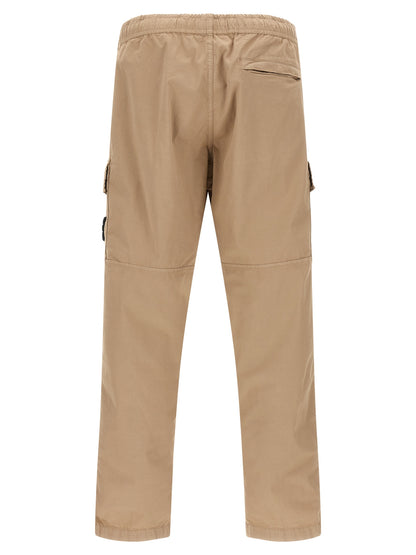 Cargo Pants by Stone Island for men in stretch organic cotton twill beige & signature features an urban chic with a and long, creating a urban chic aesthetic for "Moon Behind the Hill".