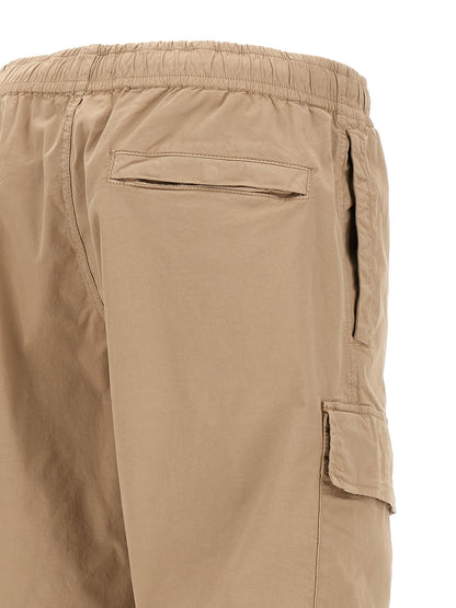 Cargo Pants by Stone Island for men in stretch organic cotton twill beige & signature presents a on trend silhouette, artfully finished with a on trend , long, and for a sophisticated look.