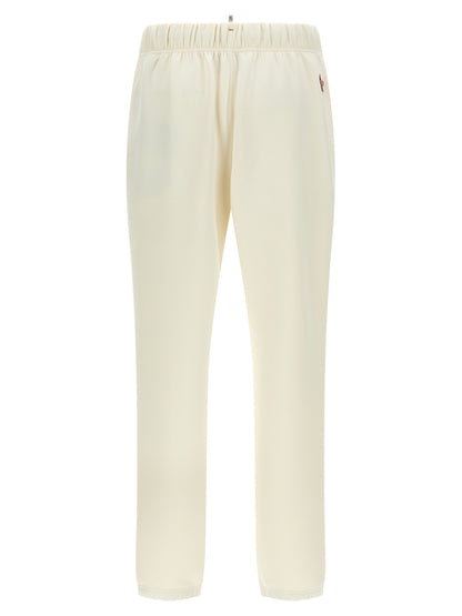 Joggers by Moncler Grenoble for women in stretch viscose polyester white & print presents a refined pantology silhouette, artfully defined by a refined pantology , long, and a sophisticated .